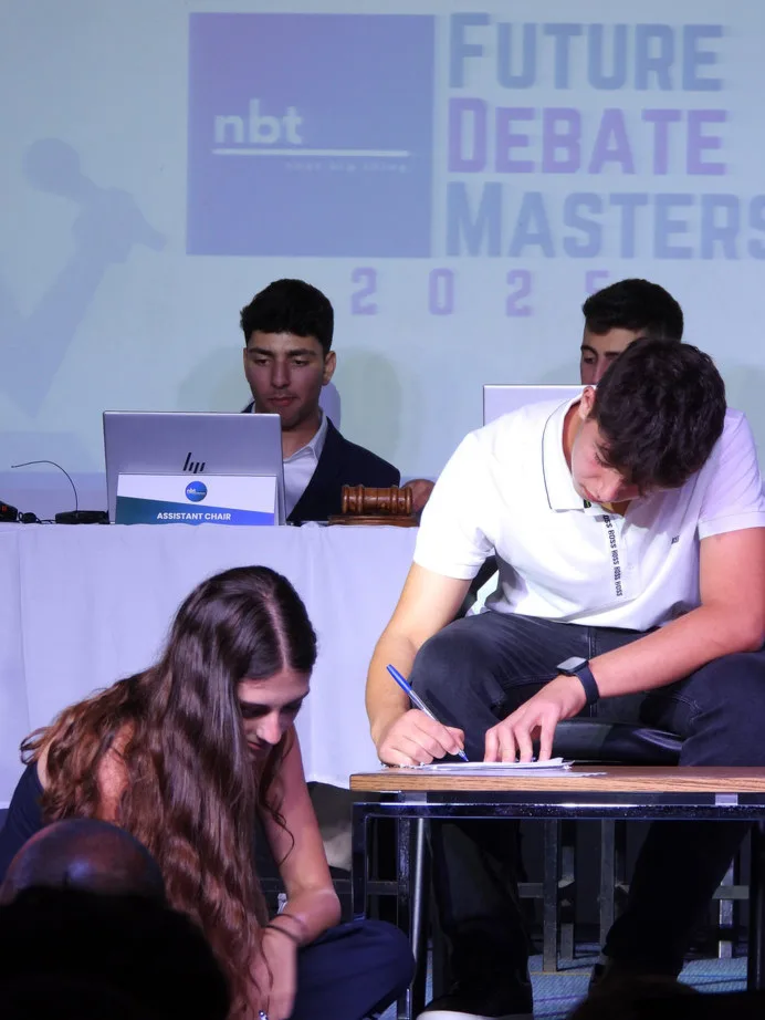 Future Debate Masters student team working during a debate activity